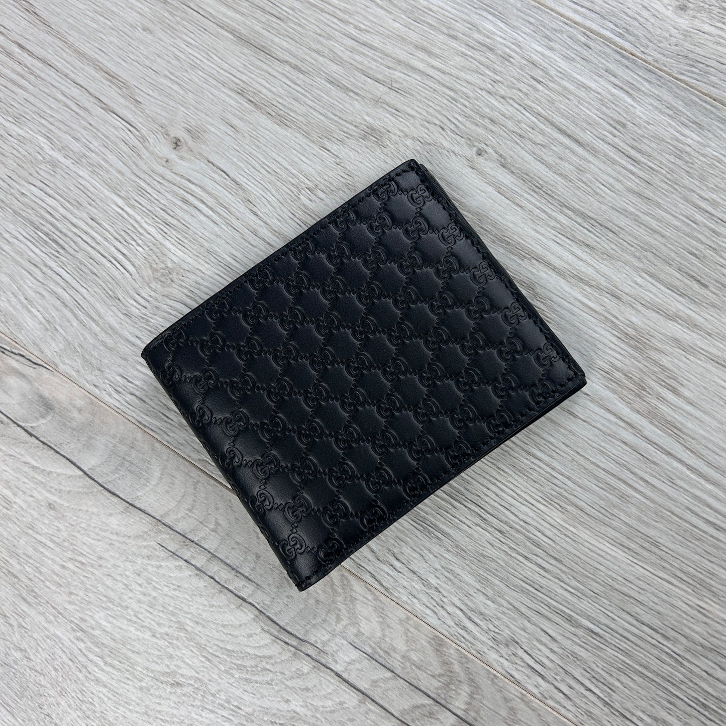 Gucci Men’s GG Leather Monogram Wallet