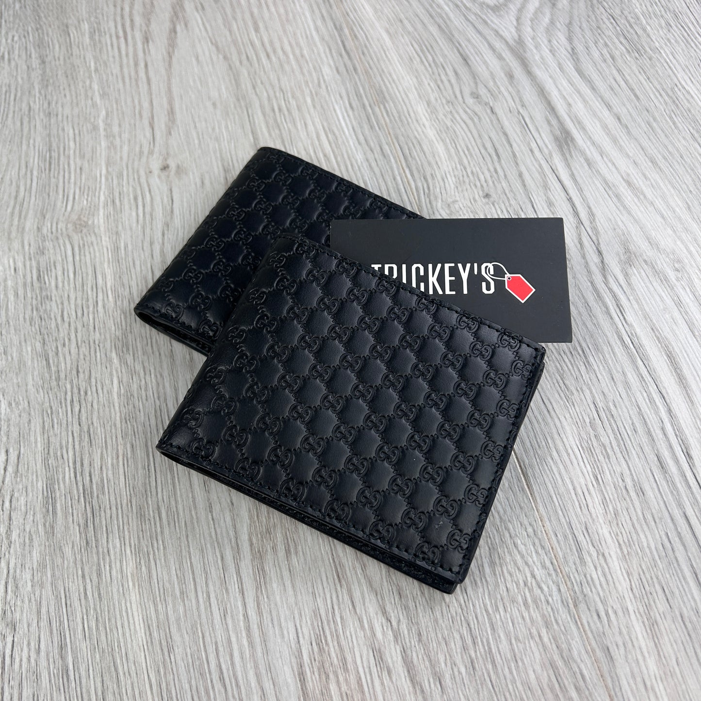 Gucci Men’s GG Leather Monogram Wallet