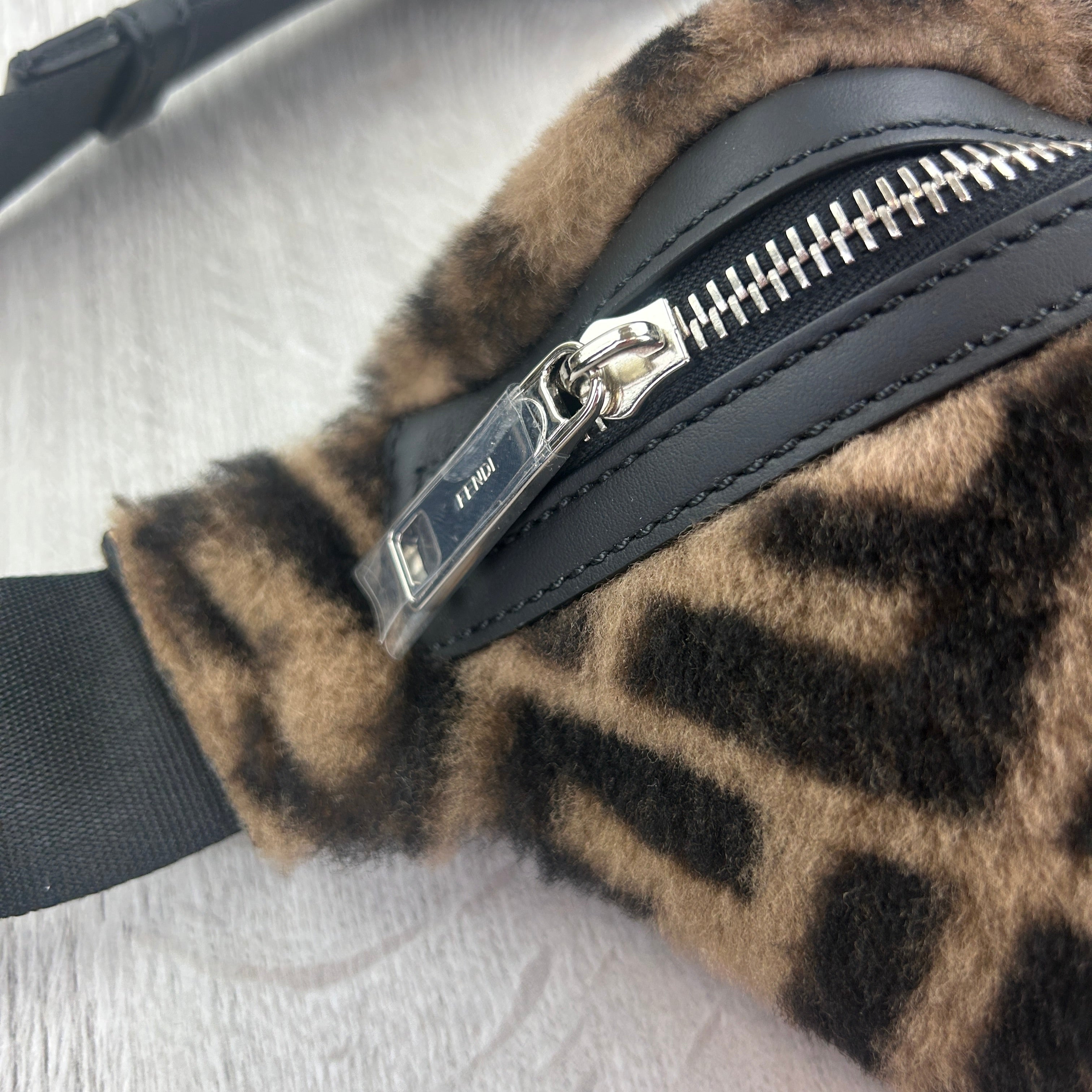 Fendi fur fanny pack online