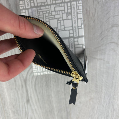 Comme des garcons black zip-up purse